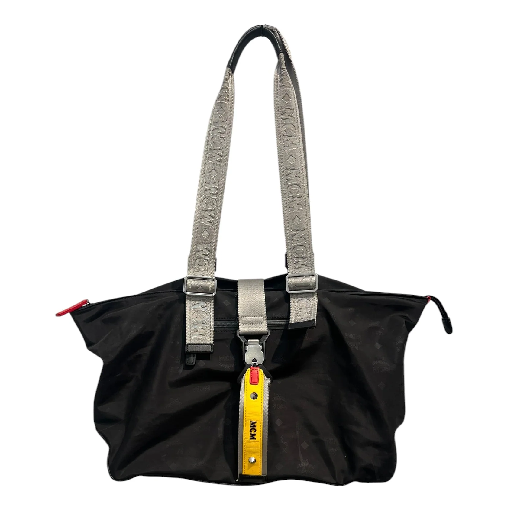 1463-mcm-tote-bag-monogram-nylon-blk-ylw-tag-on-buckle-gry-handles-1.webp MCM/Tote Bag/Monogram/Nylon/BLK/ylw tag on buckle/ gry handles
