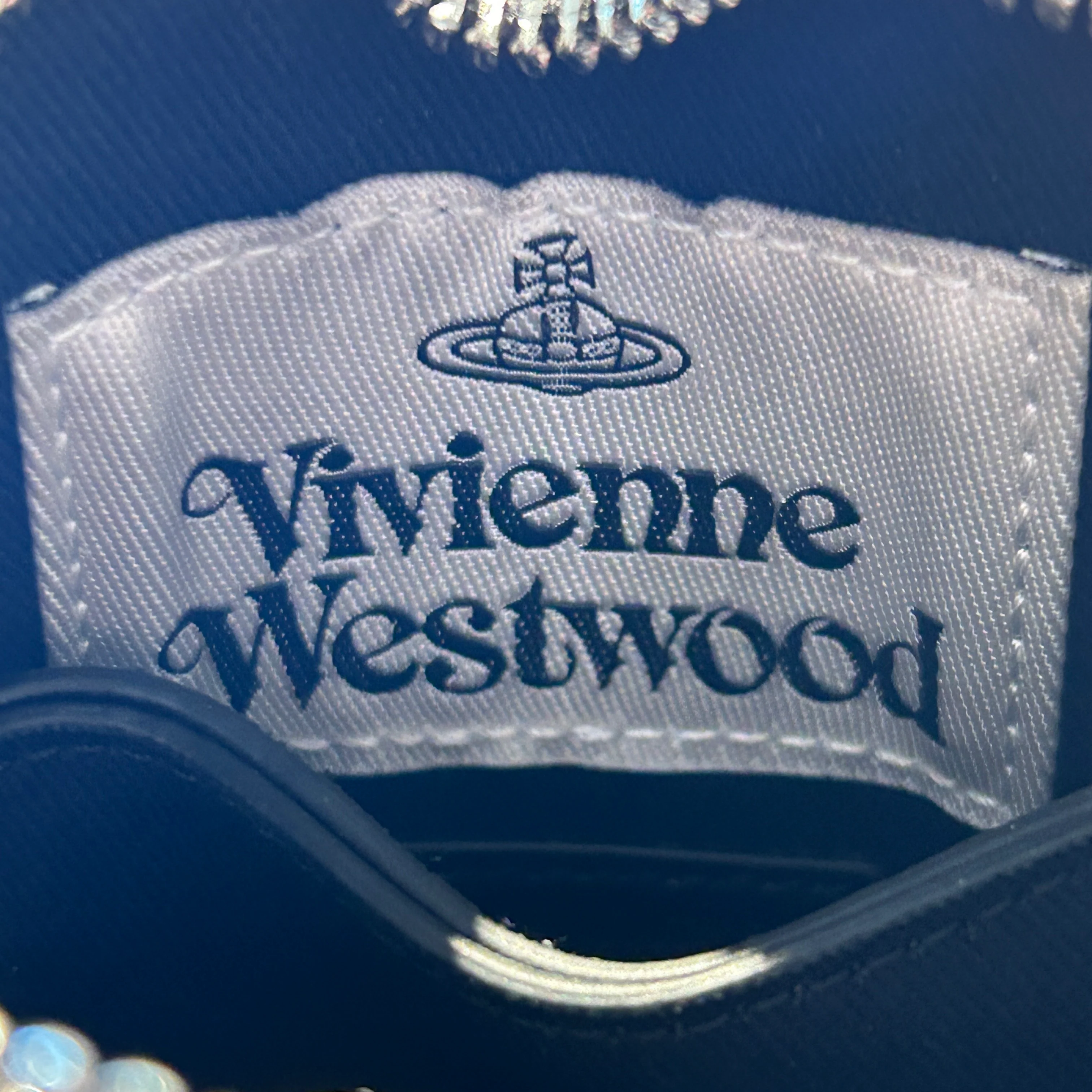2385-vivienne-westwood-cross-body-bag-leather-blk-nappa-thin-line-heart-wristlet-5.webp Vivienne Westwood/Cross Body Bag/Leather/BLK/nappa thin line heart wristlet