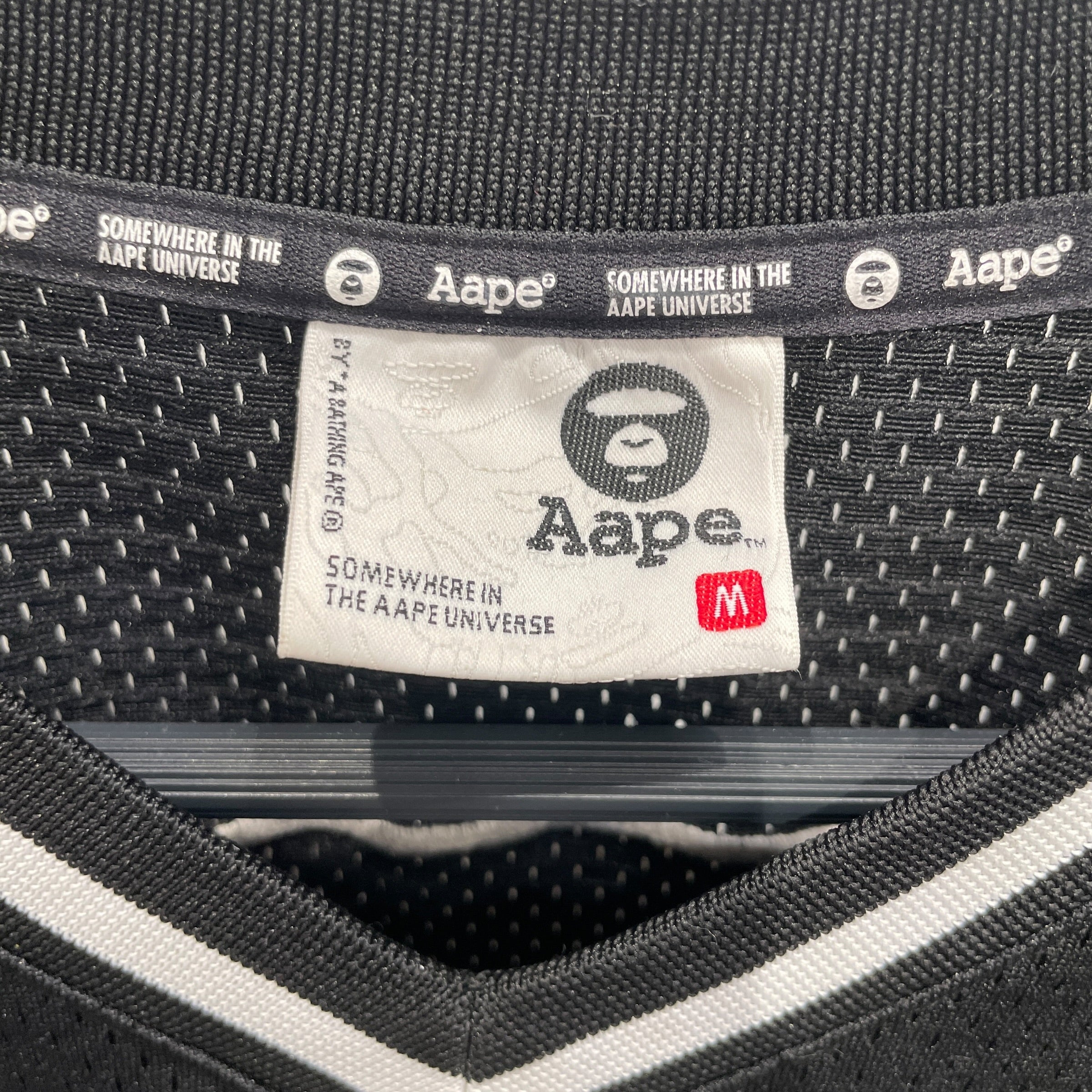 AAPE BY A BATHING APE/T-Shirt/M/Nylon/BLK/Graphic/AAPE UNVS JERSEY
