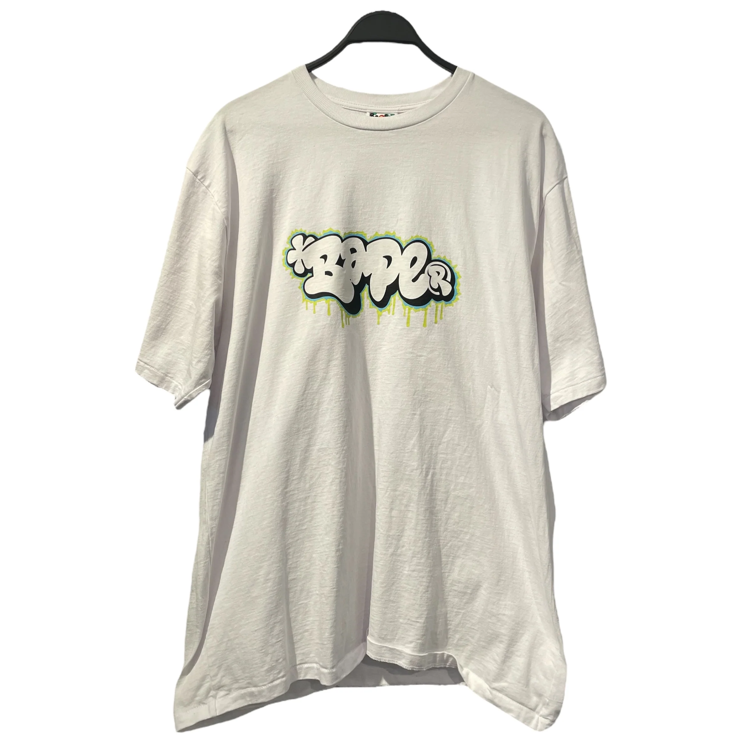 79-a-bathing-ape-t-shirt-xxxl-cotton-wht-graphic-bape-bape-logo-graphic-1.webp A BATHING APE/T-Shirt/XXXL/Cotton/WHT/Graphic/BAPE "BAPE" LOGO GRAPHIC