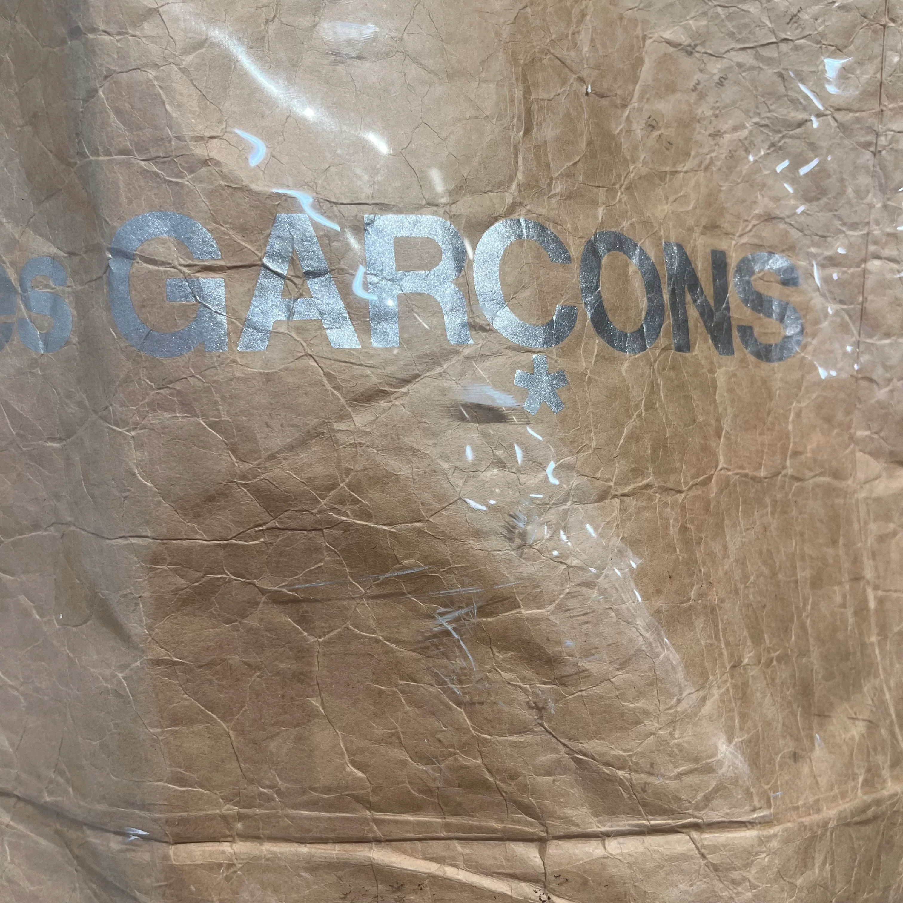 COMME des GARCONS/Tote Bag/BEG/pvc silver logo